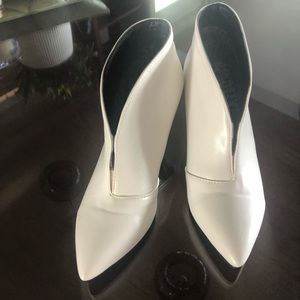 Never worn white booties.